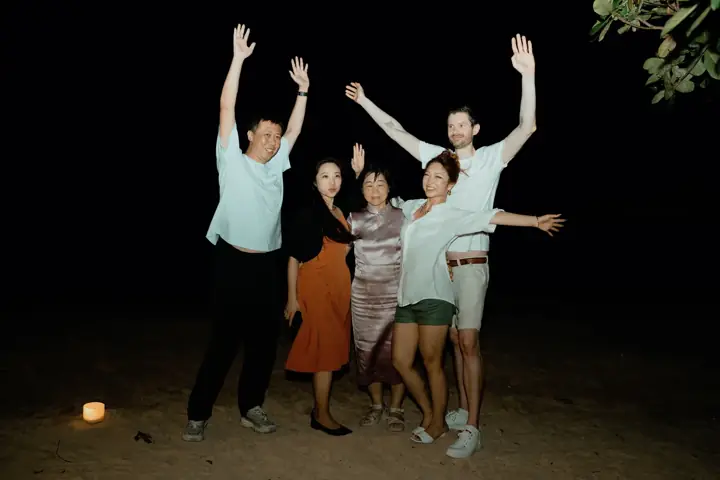 Bali friends group photo night beach